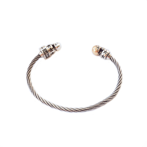 Браслет серебряный "трос с черепами" бронза, чернение.