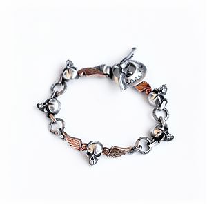 Браслет серебряный, чернение, крылья золотые.